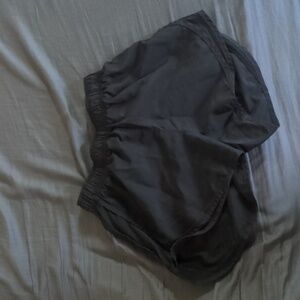 Black Nike running shorts
